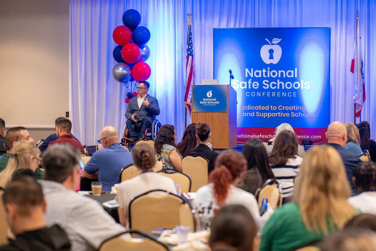 Speaker addressing attendees at the National Safe Schools Conference 2026 in Anaheim